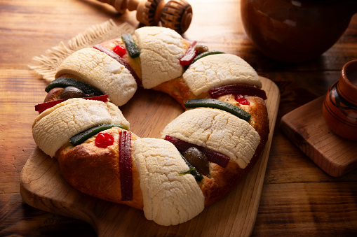 Three Kings Bread also called Rosca de Reyes, Roscon, Epiphany Cake, traditionally served with hot chocolate in a clay Jarrito. Mexican tradition on January 5th.