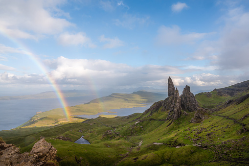 Double rainbow over old man of storr. landscape and travel concept