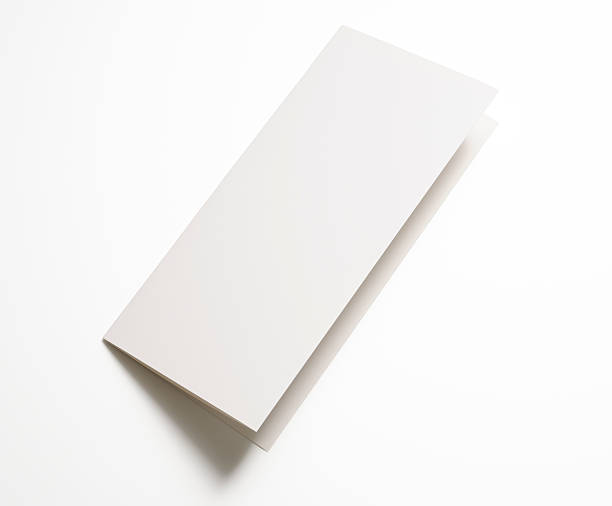 istock Isolated shot of blank folded paper on white background 185054522