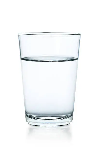Photo of Clear glass of water on a white background