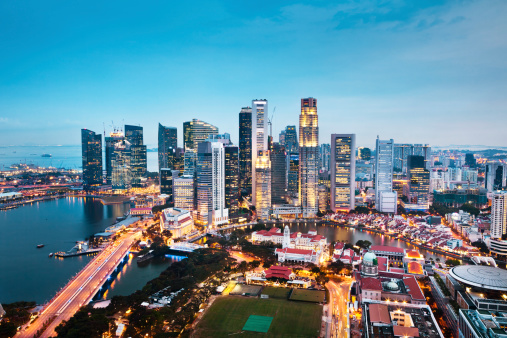 The Central Business District in Singapore City at twilight.