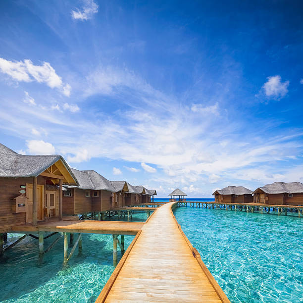 Maldives Boardwalk overwater bungalows boardwalk on Maldives water bungalow maldives stock pictures, royalty-free photos & images