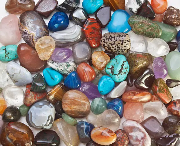 Collection of polished Semi-precious stones. Semi-precious gems used in alternative medecine and crystal healing.