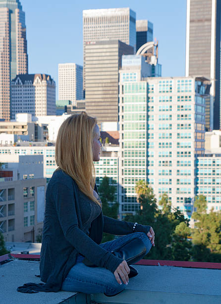 istock Beautiful woman looking at city 185058716