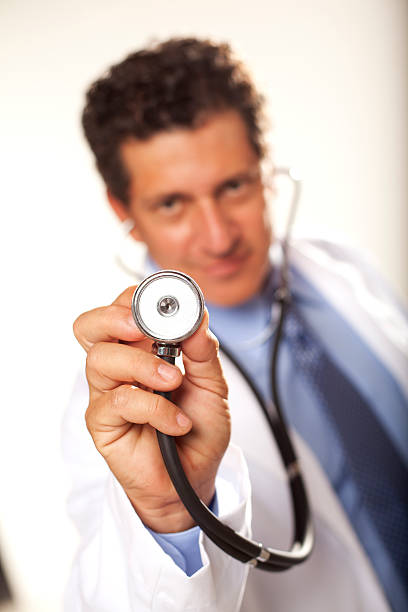 Smiling Doctor with Stehoscope stock photo