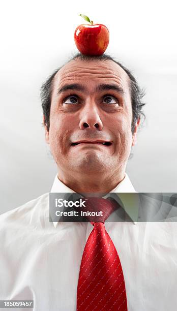 Executive With Apple Stock Photo - Download Image Now - Adult, Adults Only, Anxiety