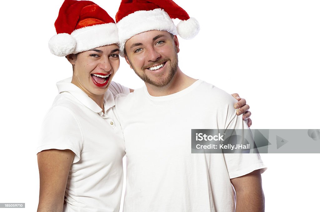 Jovem mulher e Homem usando gorro de Papai Noel - Foto de stock de Adulto royalty-free