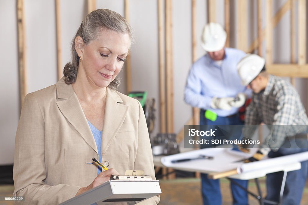 Construtor em um local de construção Executivo - Royalty-free Adulto Foto de stock
