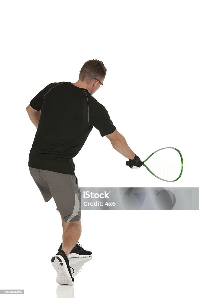 Człowiek Gra gra w tenisa - Zbiór zdjęć royalty-free (Białe tło)