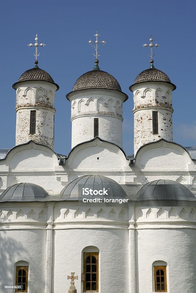 Church steeples "Steeples of a church inside the wall of a monastery in Suzdal, Russia.Clochers daaAglise A  laaintrieur de laaenceinte daaun monastAre A  Souzdal, en Russie." Architectural Dome Stock Photo