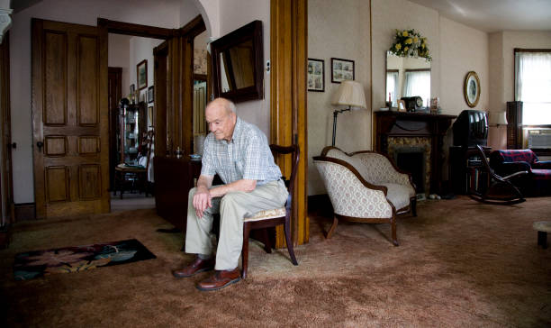 istock Senior Citizen sitting in a chair 185061826