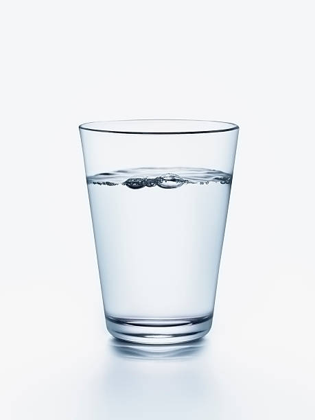 istock Glass of water on a white background 185062096