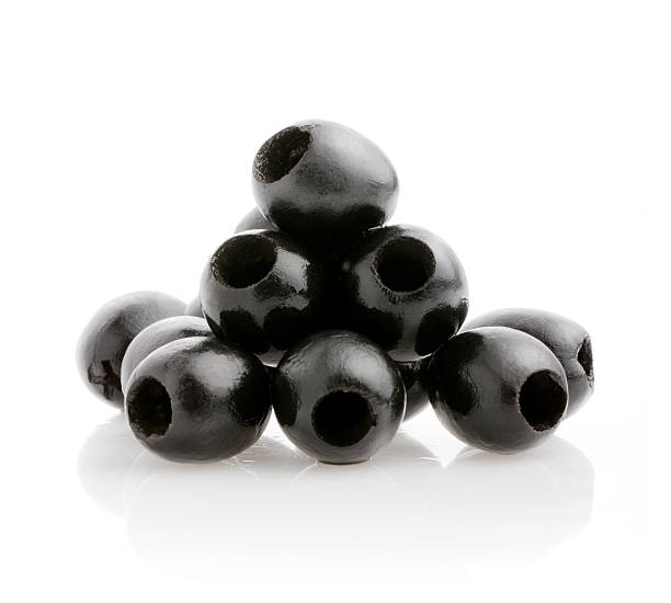 Black Olives Black olives on white background. Black Olives stock pictures, royalty-free photos & images