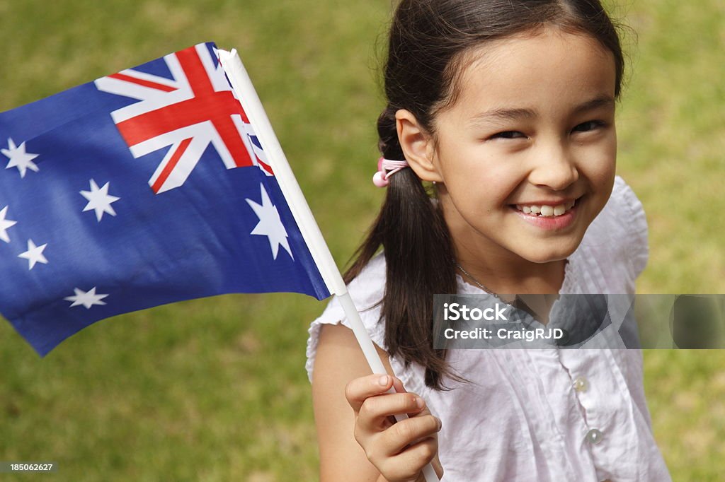 Australian Girl Girl waving an Australian flag Australia Day Stock Photo