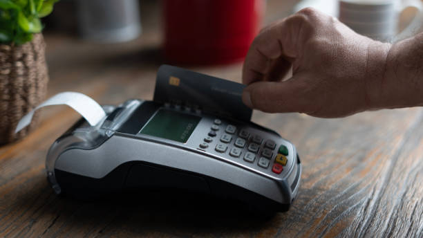 istock credit card payment with electronic pos machine 1850626469