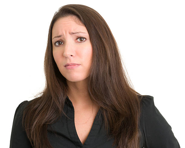 istock Uncertain Frowning Young Woman 185062857