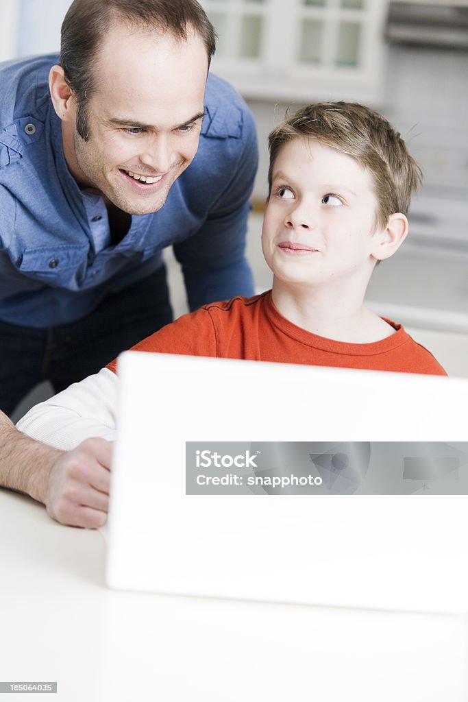 Computer In Father Father And Son Using Computer Stock Photo - Download Image Now - Adult ...