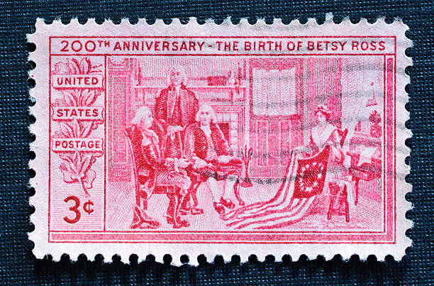 Besty Ross Stamp "The 3-cent commemorative stamp honoring Betsy Ross was issued in Philadelphia on January 2, 1952, on the 200th anniversary of her birth.  According to tradition, in June 1776 Betsy Ross met with George Washington, Robert Morris, and George Ross in her home, where she conducted an upholstery business, to discuss and design the nation's flag. Ross soon thereafter stitched together the first ""stars and stripes.""" betsy ross house stock pictures, royalty-free photos & images