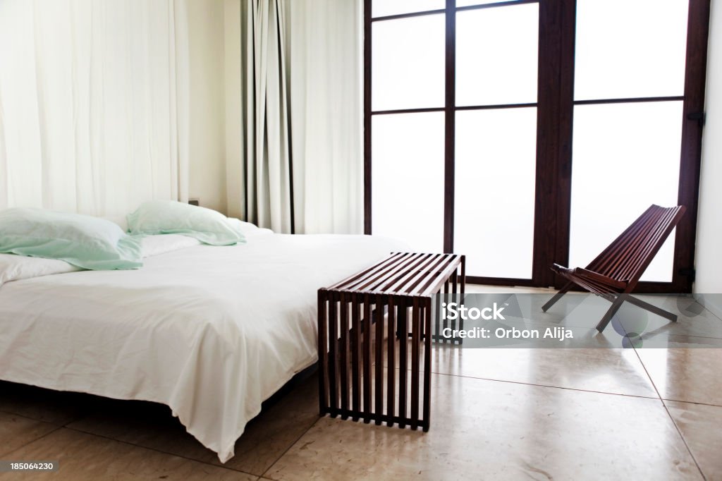 Interni di lusso della camera da letto - Foto stock royalty-free di Disinvolto