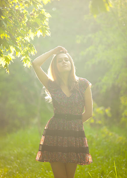 istock Young woman in spring park 185064271