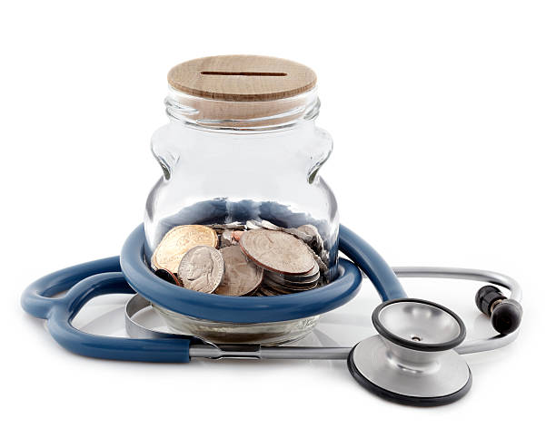 医療費 - currency stethoscope healthcare and medicine savings ストックフォトと画像