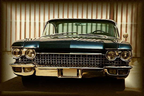 vintage car, toned image, added film grain, 