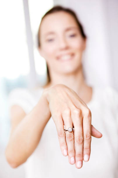 istock Young woman showing her engagement ring 185064770