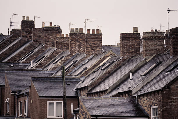 Typically English rooftops of terraced houses Photographed in Durham, Northeastern England. Scanned from Ektachrome E100G anglo saxon photos stock pictures, royalty-free photos & images