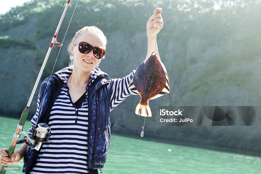 Fishing Woman fishing at Kamchatka Fishing Stock Photo