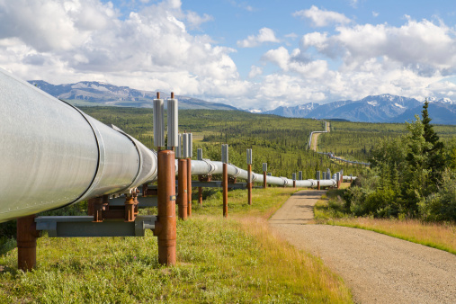 The Alaska Oil pipeline an engineering marvel travels north and south from Prudhoe Bay to the port of Valdez Alaska