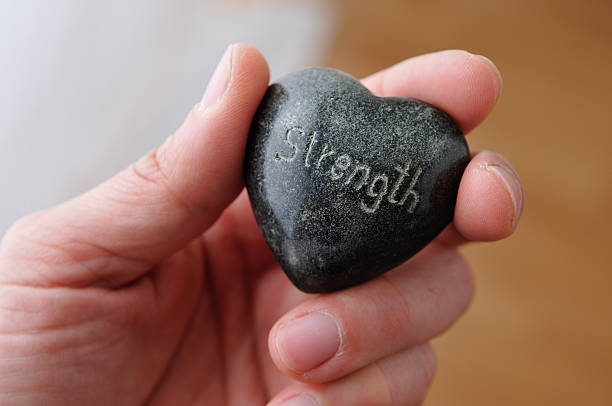 istock Polished Stone Heart and Hand 185065502