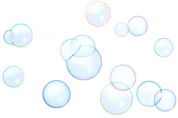floating soap bubbles photographed floating soap bubbles isolated on pure white. clipping path included. soap sud photos stock pictures, royalty-free photos & images