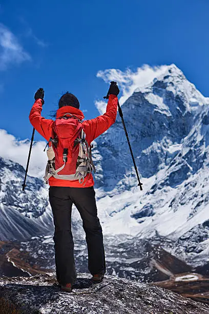 Photo of Woman looking at Ama Dablam, Mount Everest National Park, Nepal