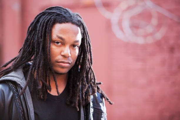 istock Portrait of young black man with dreadlocks 185066021