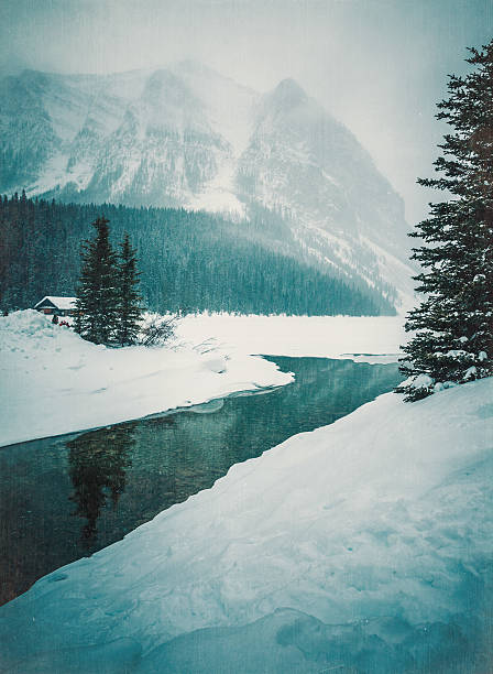 lake louise banff winter scene "lake louise in banff national park, alberta -canadawinter scene, very cold temperatures - overlay textures added" ca04 stock pictures, royalty-free photos & images