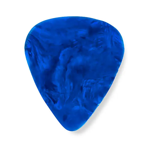 "Photo of a blue, patterned, plastic guitar pick/plectrum showing signs of use"