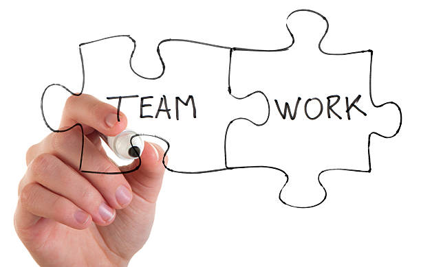 istock Woman drawing a partnership jigsaw concept 185067570