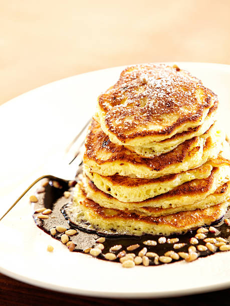 istock Pancakes with hot chocolate and pine nuts 185067714