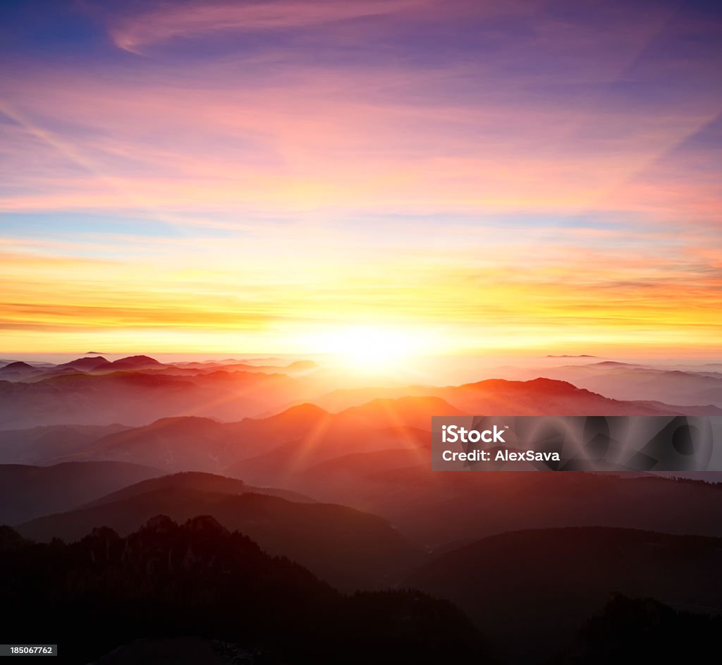 majestic sunrise over the mountains Sunrise - Dawn Stock Photo