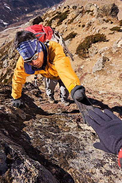 istock Nepali sherpa climbing in Himalayas 185067770