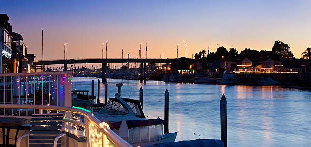 Channel Islands Harbor at Dusk "Channel Islands harbor just after sunset on the main channel, decorated for the holidays.  Near Oxnard, Ventura county, California.  Panorama.See California SERIES:" marina california stock pictures, royalty-free photos & images