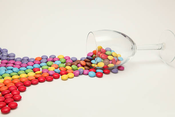 Plastic tubes filled with the colourful liquid on the white background