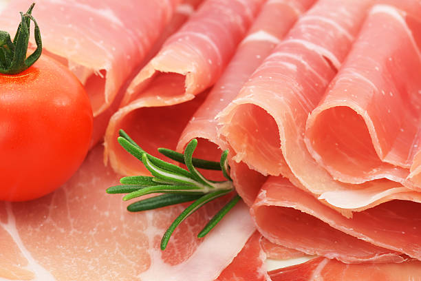 istock Prosciutto with rosemary and cherry tomato 185068093