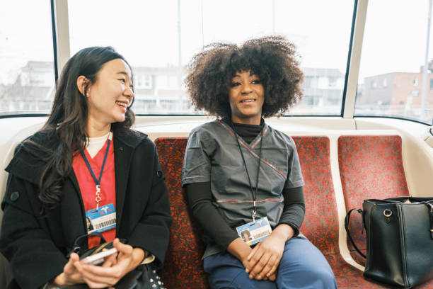istock Two female registered nurses on the street car 1850681989