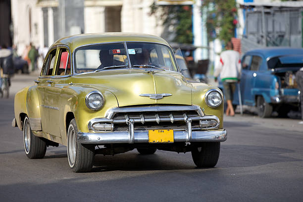 istock cuba cars on the road 185068370