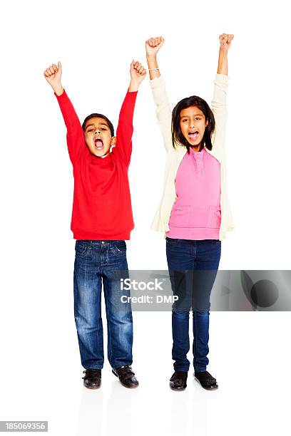 Young Children Gesticular Éxito En Blanco Foto de stock y más banco de imágenes de Alegre - Alegre, Alegría, Alzar la mano