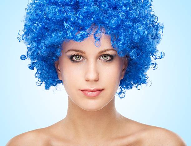 istock Beautiful model in a big blue afro wig 185069652