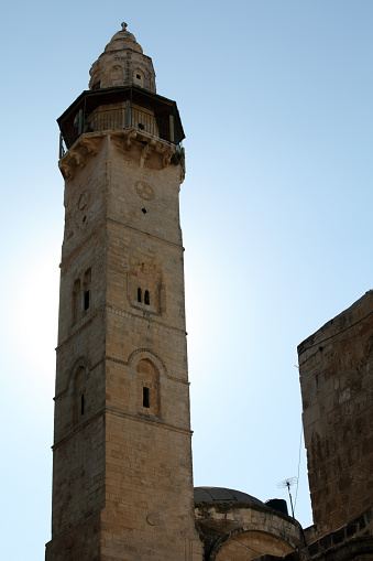 mosque of Omar against the sun - seen from the church of the holy sepulchre - old city of Jerusalem, Israel