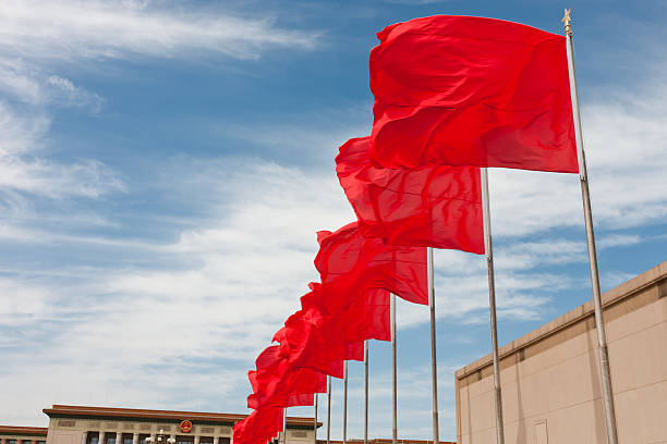 Red flag flying in Tiananmen Square, Beijing, China stock photo