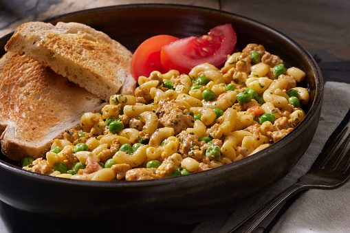 Cheesy Ground Chicken and Noodle Skillet Meal with Tomatoes and Toasted Bread